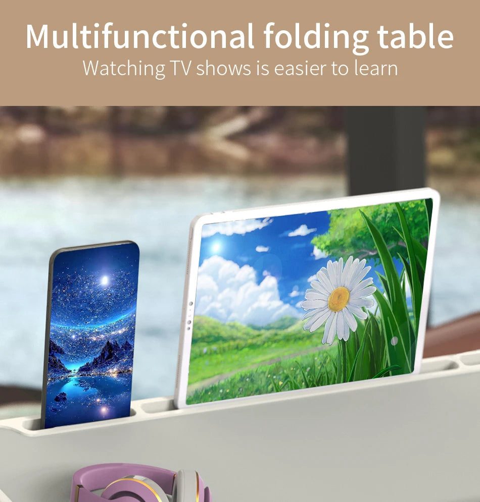 Una mesa plegable con una tableta mostrando una escena de la naturaleza, junto a un smartphone.