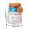 A glass jar filled with blue liquid and a cork lid, labeled for you to read me when happy anxious lonely angry or sad.