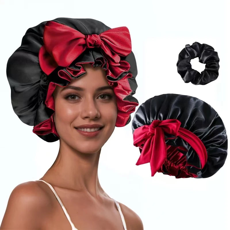 A woman models a black satin silk hair bonnet with a large red bow, shown alongside separate bows.
