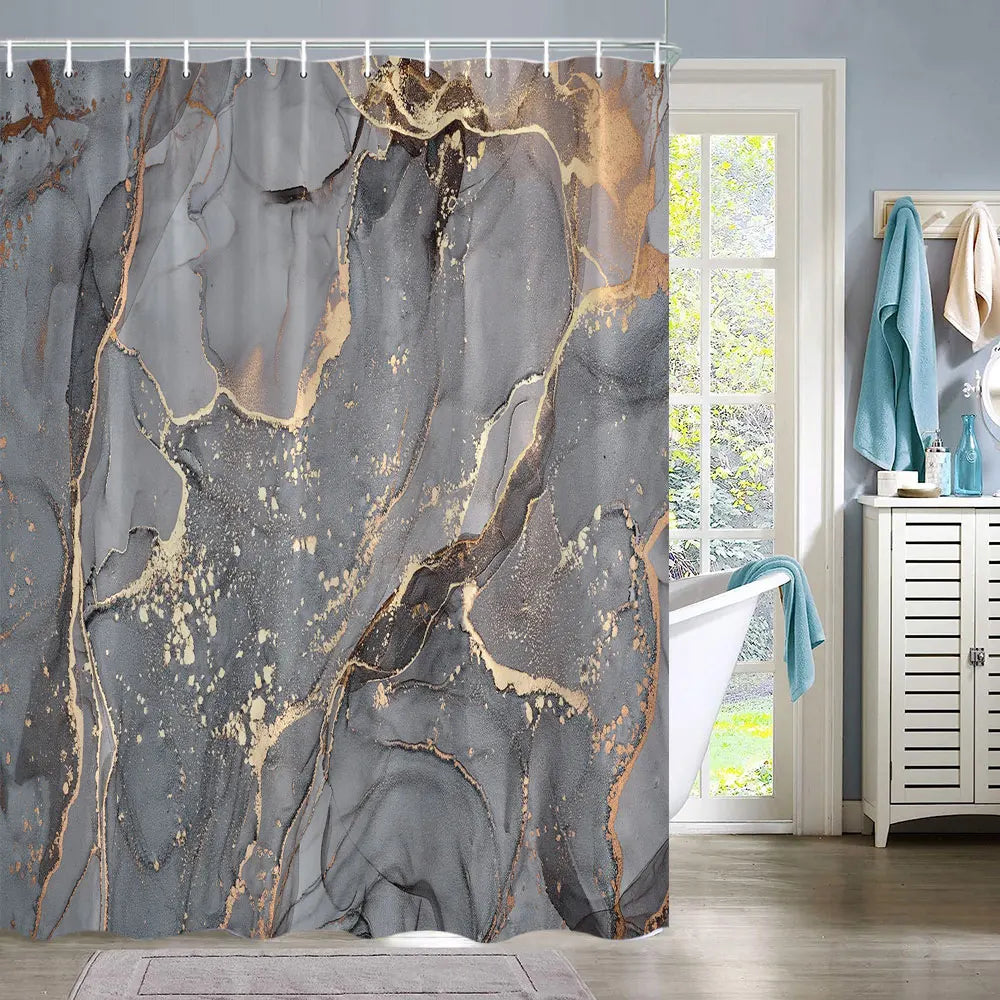 A shower curtain featuring abstract marble texture in shades of gray, black, and gold veins.