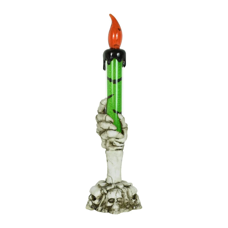 A Halloween LED candle featuring a skeleton hand holding a green candle with an orange flame.