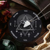 A black divination circle featuring a triangle design and various words like YES, MAYBE, and REPHRASE, set on a wooden surfac