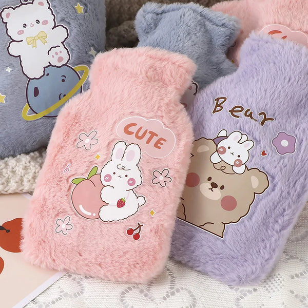 A collection of pink and purple plush cartoon hot water bottles featuring cute animal characters like rabbits and bears.