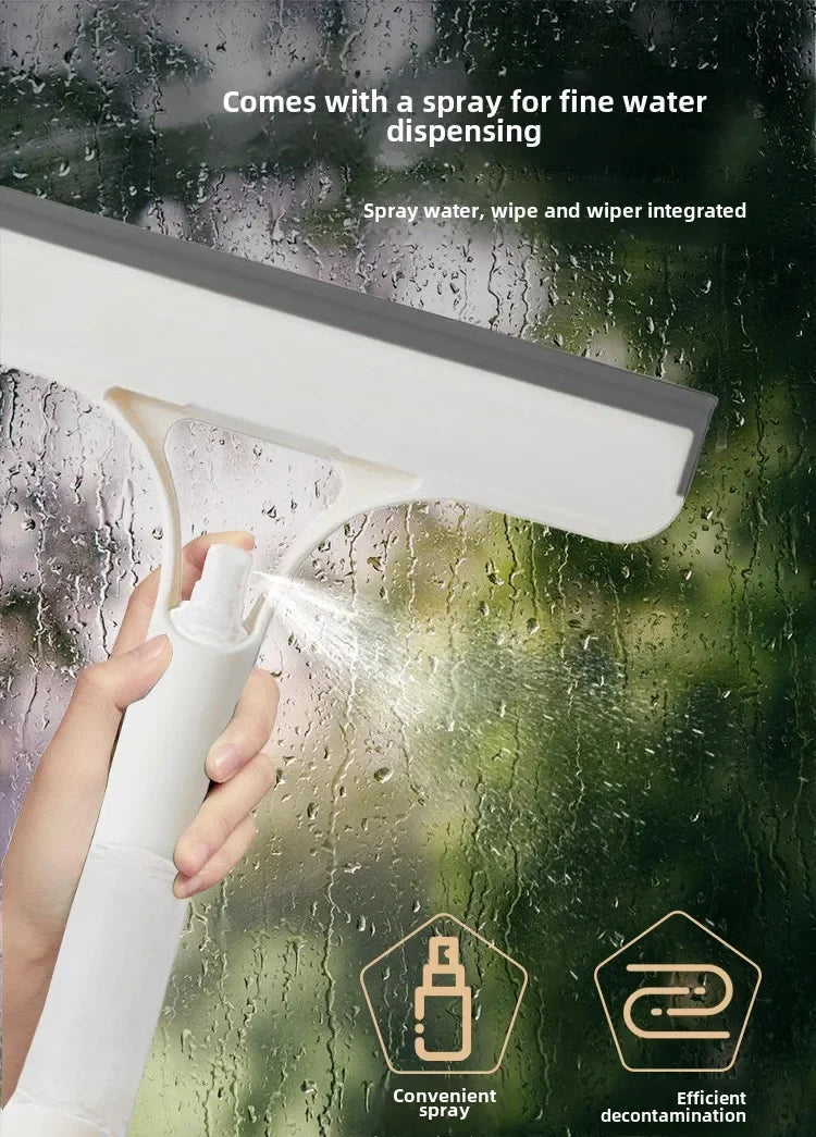 A hand is using a white spray bottle with an integrated wiper for fine water dispensing on a glass surface.