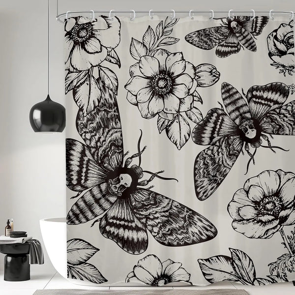 A shower curtain featuring a black and white gothic design with floral and butterfly motifs.