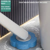 A white disposable toilet brush handle is shown cleaning dead corners on the ground.