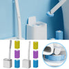 A long-handled disposable toilet brush cleaning kit shown with various brush heads and a white base.