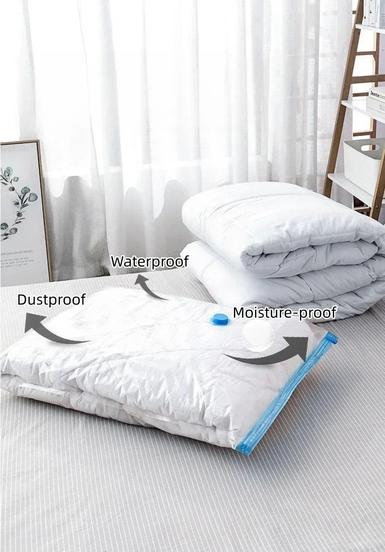 White vacuum storage bags with hand pump for clothes and blankets shown on a bed.