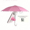 A pink umbrella shade is shown above a smartphone, demonstrating the color of the area.