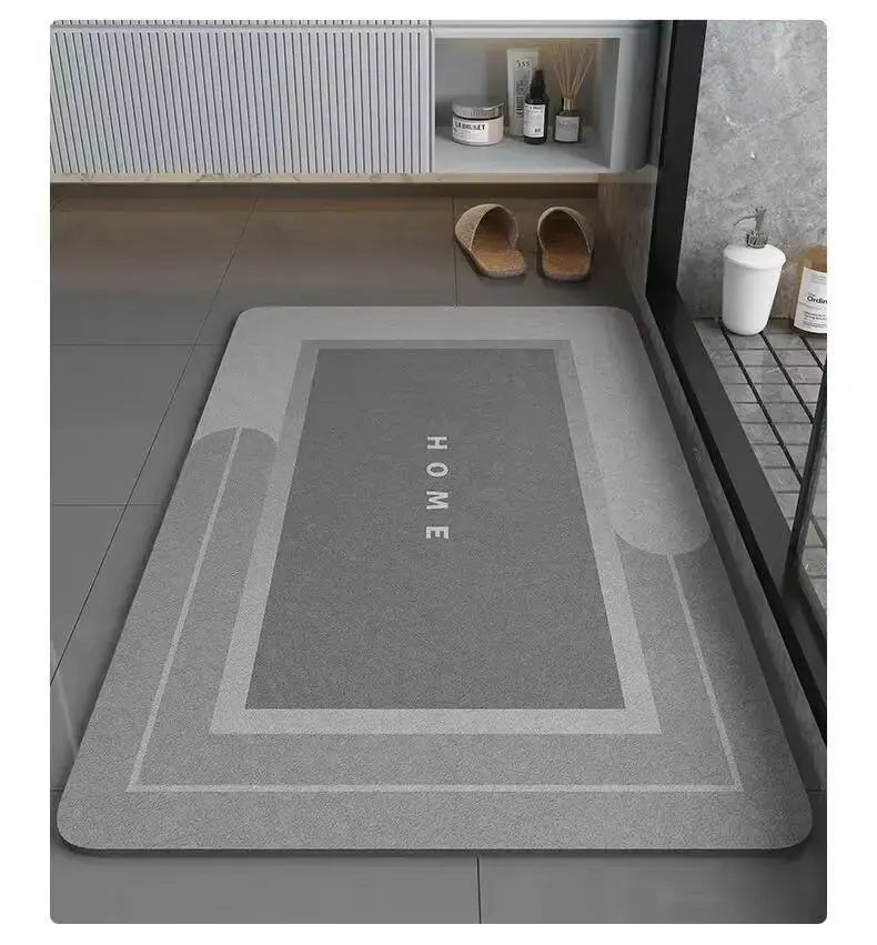 A gray anti-slip floor mat is displayed in a modern bathroom setting with storage shelves above.