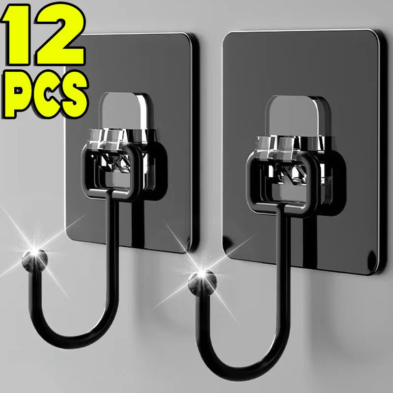 Twelve heavy-duty self-adhesive wall hooks with black metal loops mounted on a gray surface.