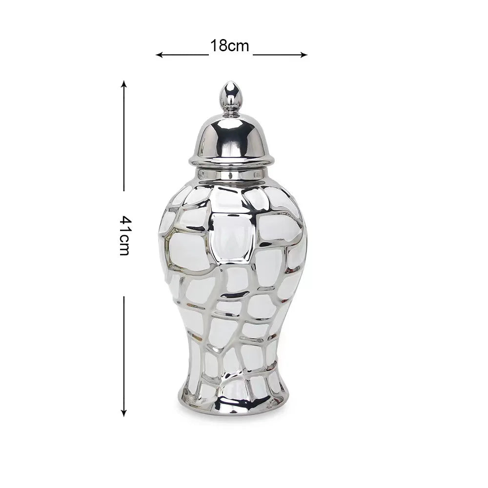 Silver ceramic flower vase with a textured, organic pattern and a lid.