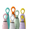 A collection of colorful compact mini umbrellas in various shades including pink, mint green, white, orange, and yellow.