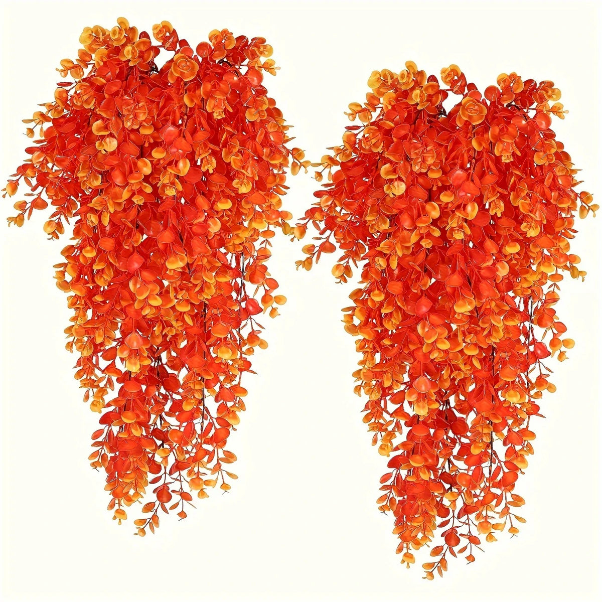 A pair of vibrant orange artificial flower garlands hanging down.