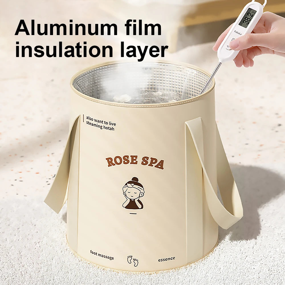 A beige foldable aluminum foot bath bucket with an insulation layer is shown next to a hand applying steam.