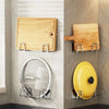 Stainless steel sponge holder rack with suction cup and wooden cutting board displayed on a wall