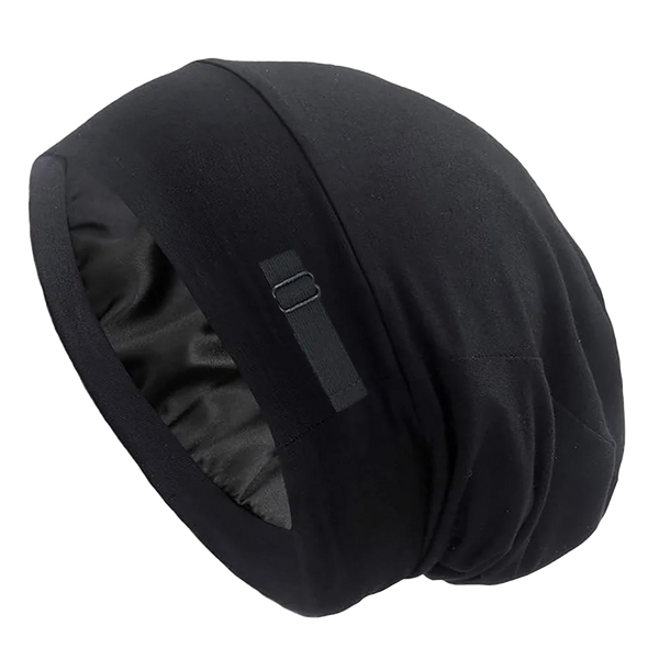 A black adjustable silk-lined night cap is shown against a dark background.
