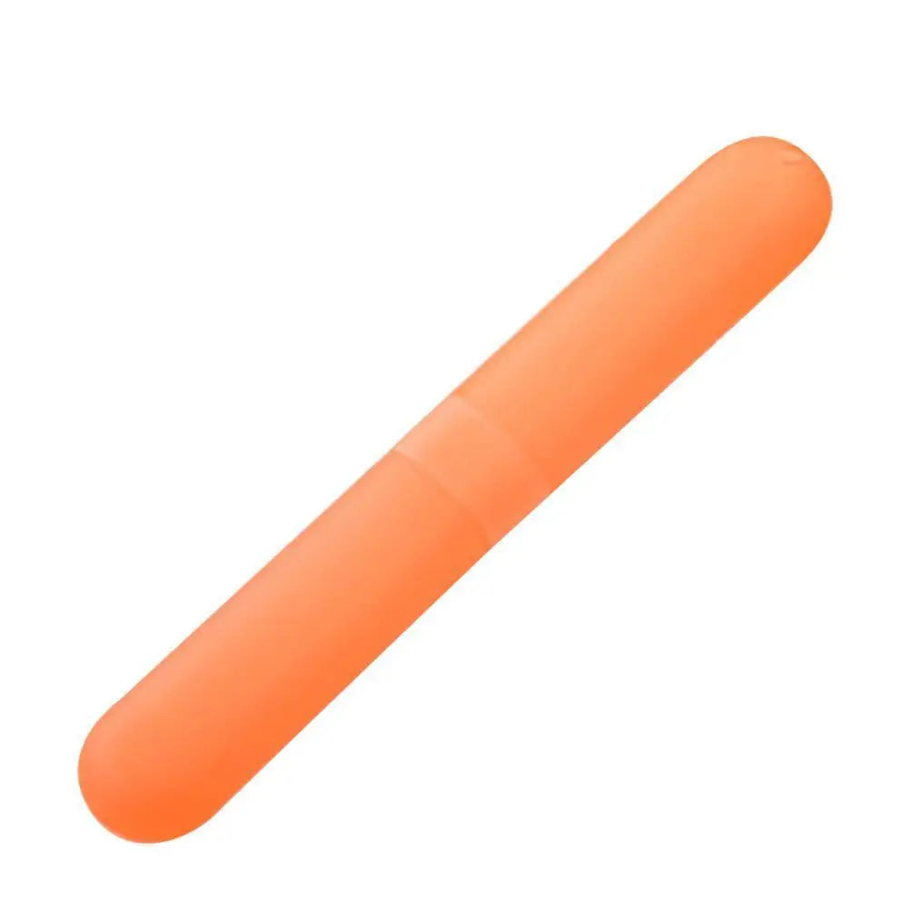 An orange, cylindrical portable toothbrush storage case viewed from the side.