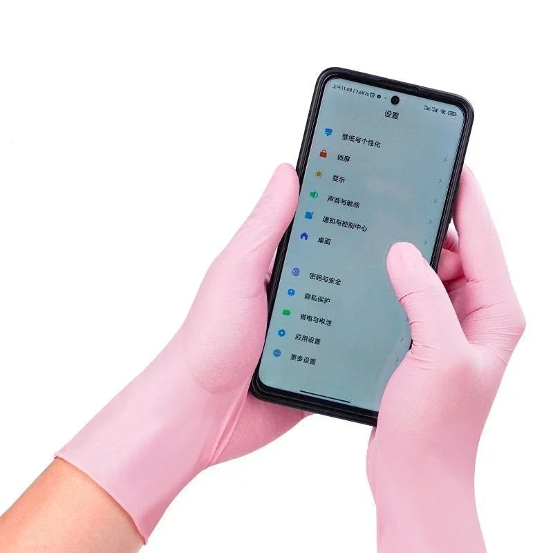 Pink disposable nitrile gloves are shown wearing a smartphone displaying a menu interface.