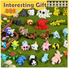 A collection of 50 mini 3D printed animal figurine toys in various colors and shapes arranged on green moss.