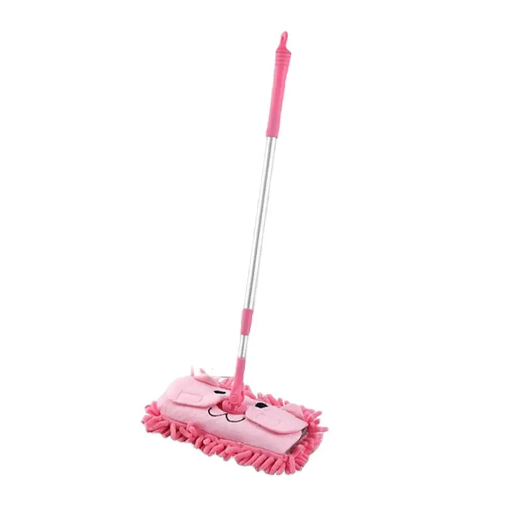 A pink toddler mini broom and dustpan set with a handle and brush head.