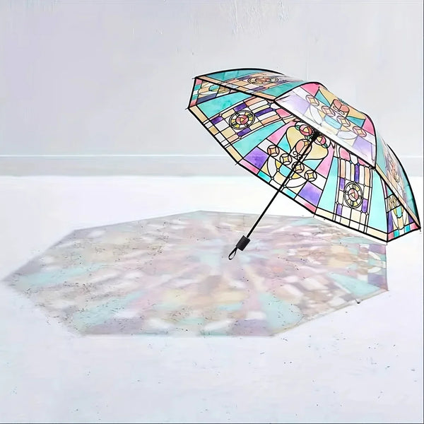 A decorative stained glass umbrella is open on a white floor, casting colorful light patterns.