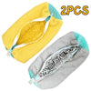 A set of two multi-use shoe cleaning bags with brushes and storage bags shown in yellow and gray.