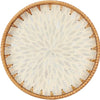 Round rattan serving tray with mother of pearl inlay featuring a radiating pattern.