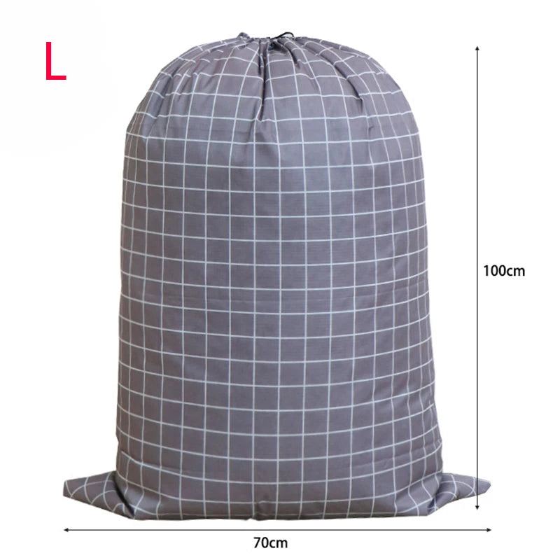 A large capacity drawstring storage bag for laundry and bedding in a gray and white checkered pattern.