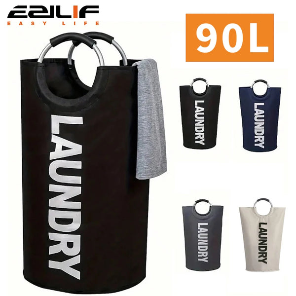 Black extra-large waterproof laundry basket with padded handle and a gray cloth hanging on the side.
