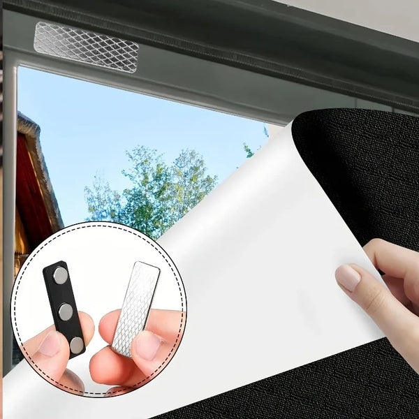 A hand is shown applying a magnetic curtain clip to a white roll of paper, demonstrating the product's use.