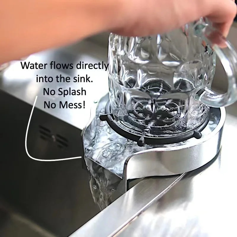 A hand is pouring water directly into a glass rinser faucet which flows into a sink with no splash or mess.
