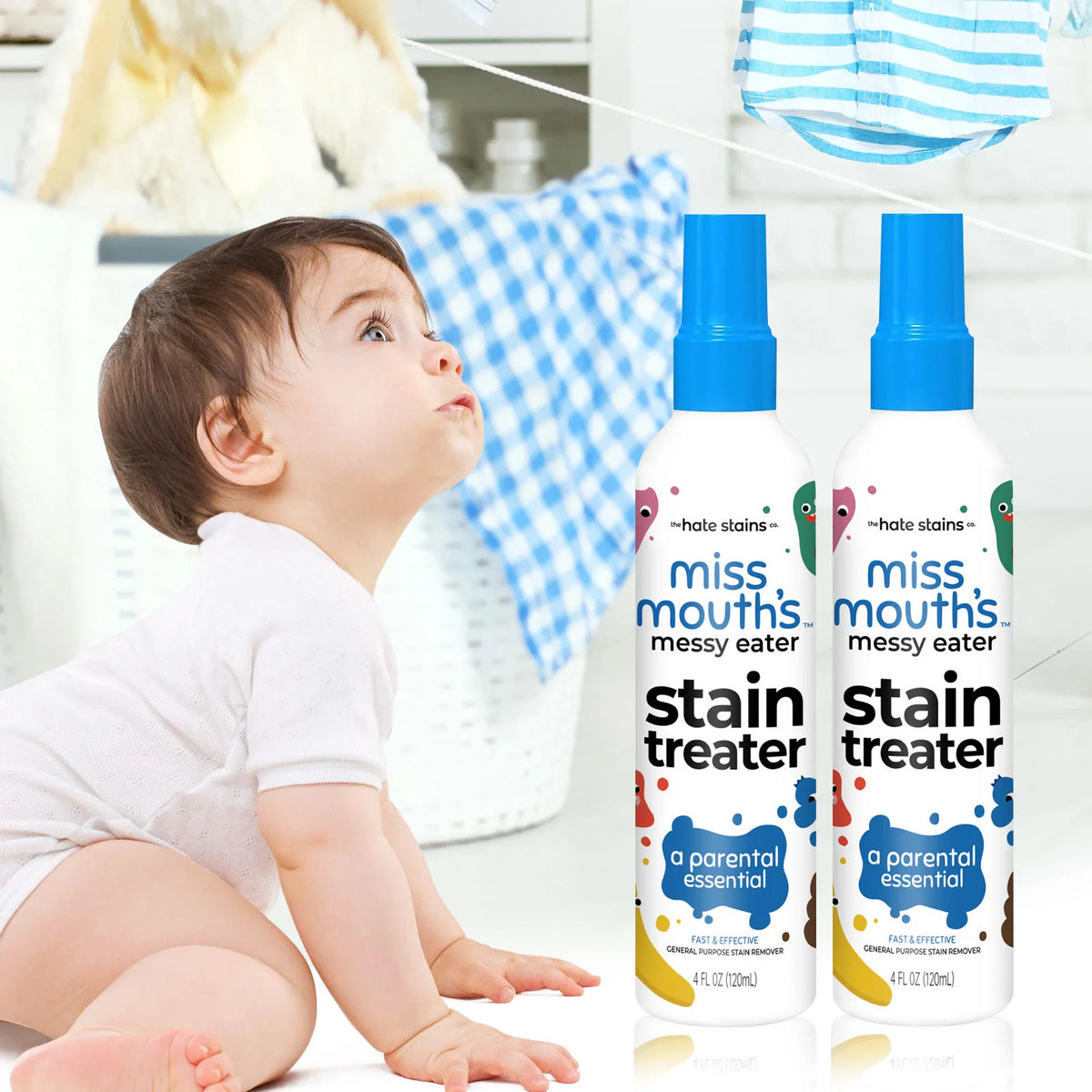 Two bottles of Miss Mouth's stain treater spray for baby stains shown next to a baby
