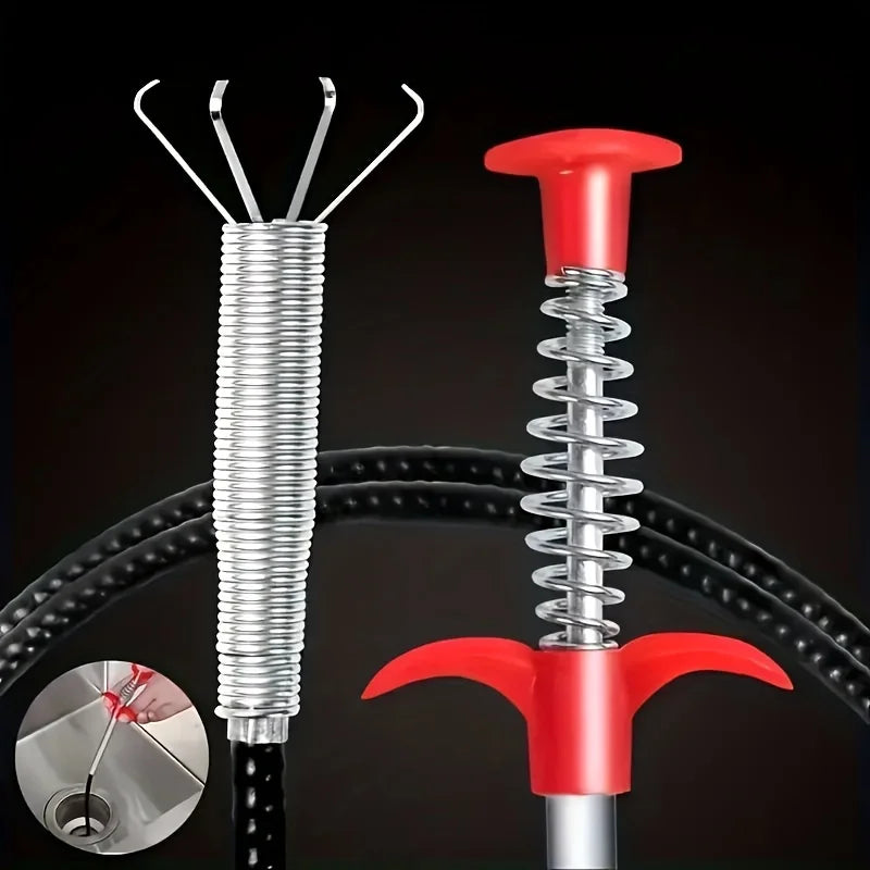 A silver drain auger with a coiled shaft and a red claw hook is shown against a black background.