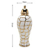 A golden ceramic flower vase with a textured, diamond-patterned body and a lid.