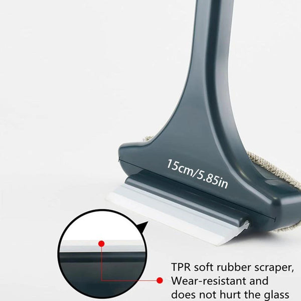 A close-up view of a gray window screen cleaning brush with a white blade and a black rubber scraper.