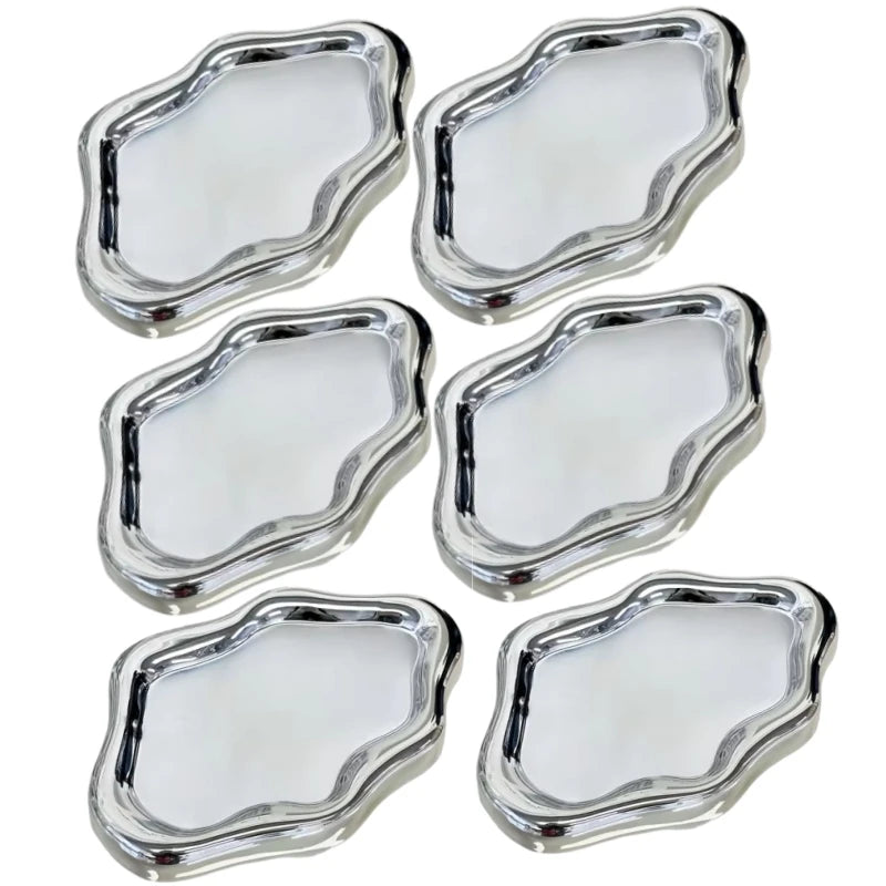 A set of five silver-toned cloud jewelry organizer trays.