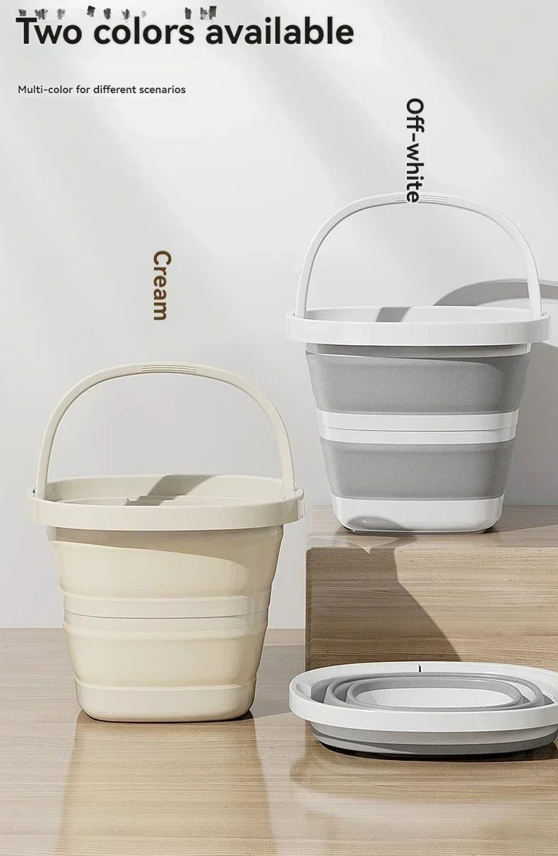 Two colors of a collapsible water bucket with handle for portable storage, cream and gray.