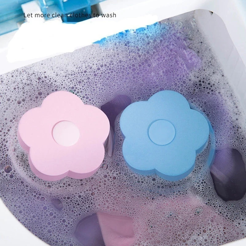 Pink and blue floating laundry mesh filter bags are visible inside a washing machine drum.