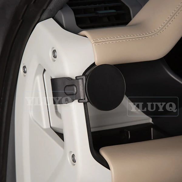 A universal magnetic car phone mount is shown mounted on a vehicle interior panel.