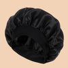 A black satin wide brim shower cap is shown from above.