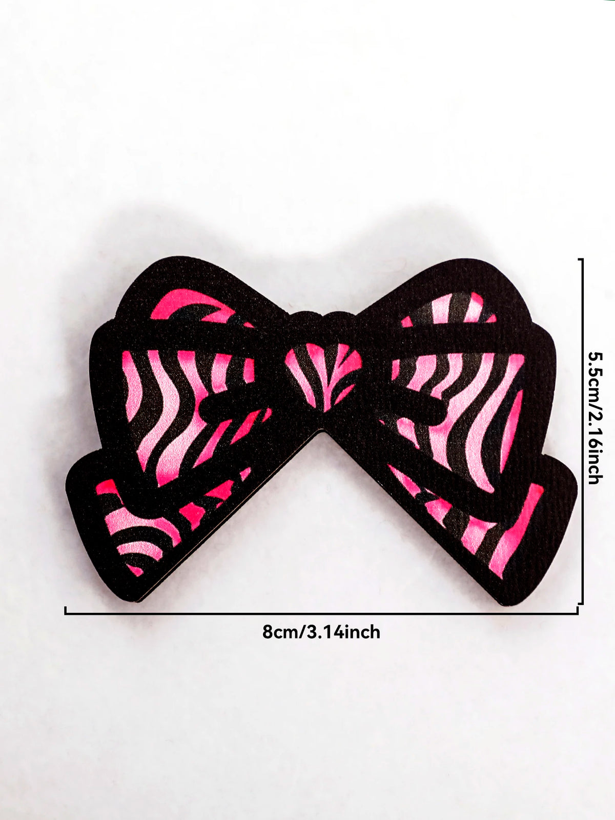 Nœud en feutre noir avec des rayures de zèbre rose, utilisé comme décoration d'écran.