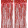 A vertical backdrop made of shimmering rose gold foil tinsel fringe curtain strands.