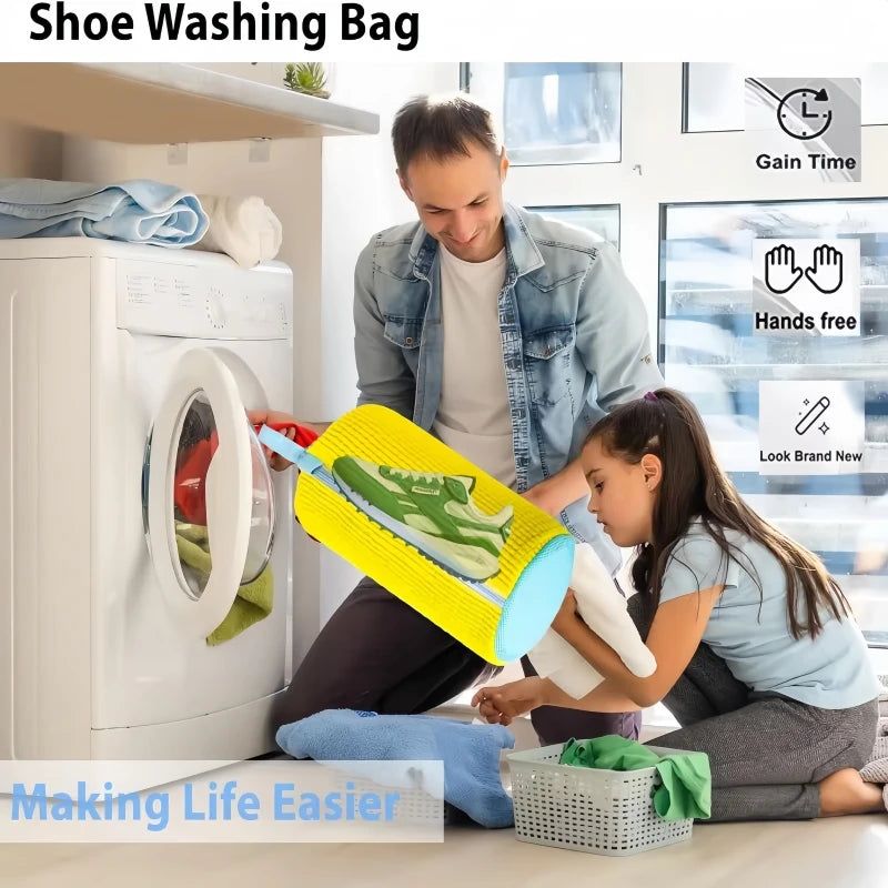 A person is using a yellow shoe washing bag to clean shoes inside a white washing machine.