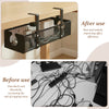 After use view of a black under desk cable management tray installed under a wooden desk.