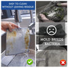 Silver microfiber cleaning pads being rinsed in a kitchen sink, demonstrating easy cleaning without residue.