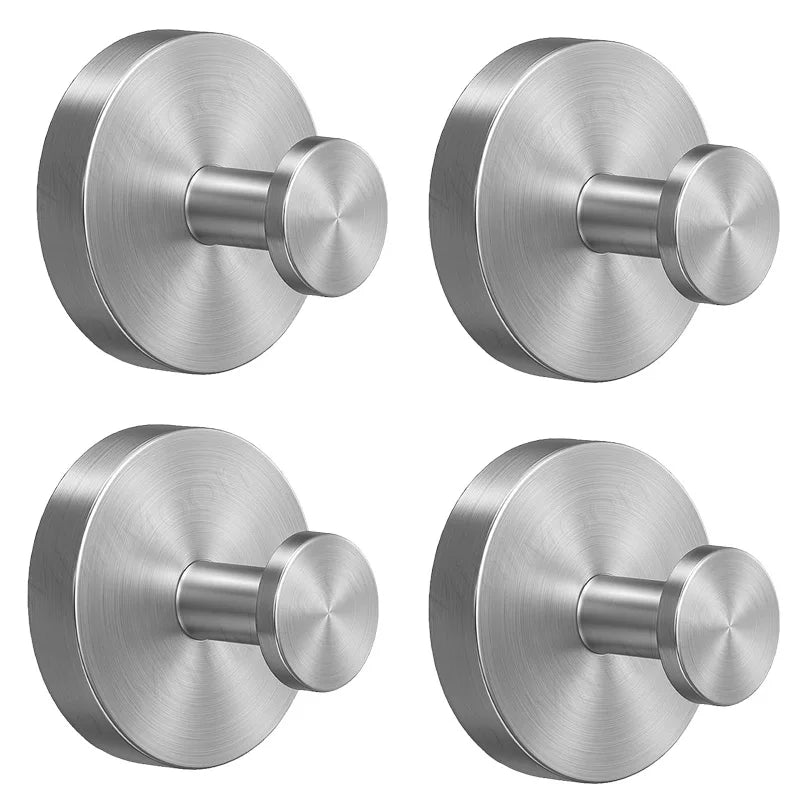 A round, brushed stainless steel suction cup towel rack with a cylindrical mounting post.