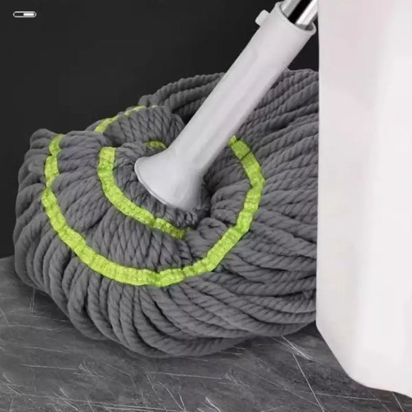 A gray rope-style mop head with a white handle is shown against a dark background.