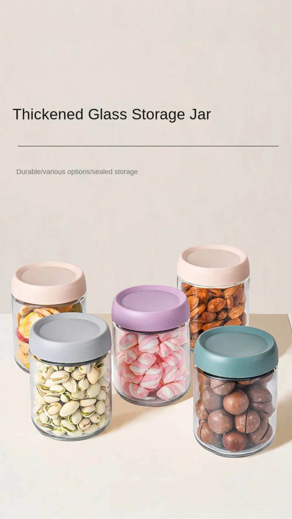 A collection of thick glass storage jars with various colored lids filled with nuts and seeds.