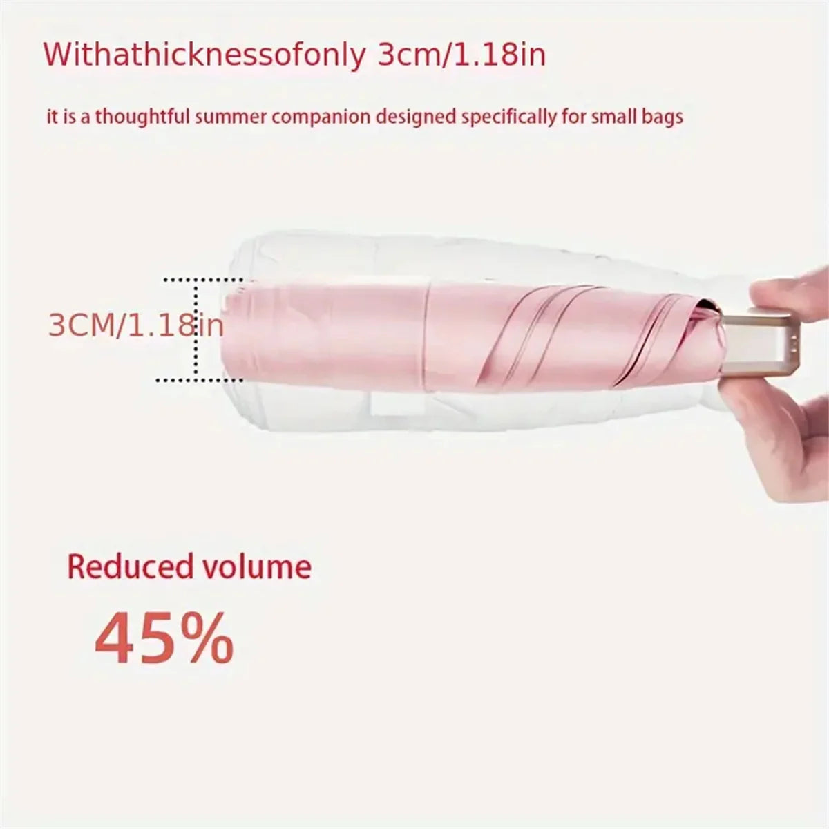 A pink compact folding UV protection umbrella is shown with its thickness measured.